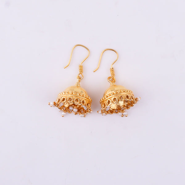 Gold earrings with intricate design and pearl drops