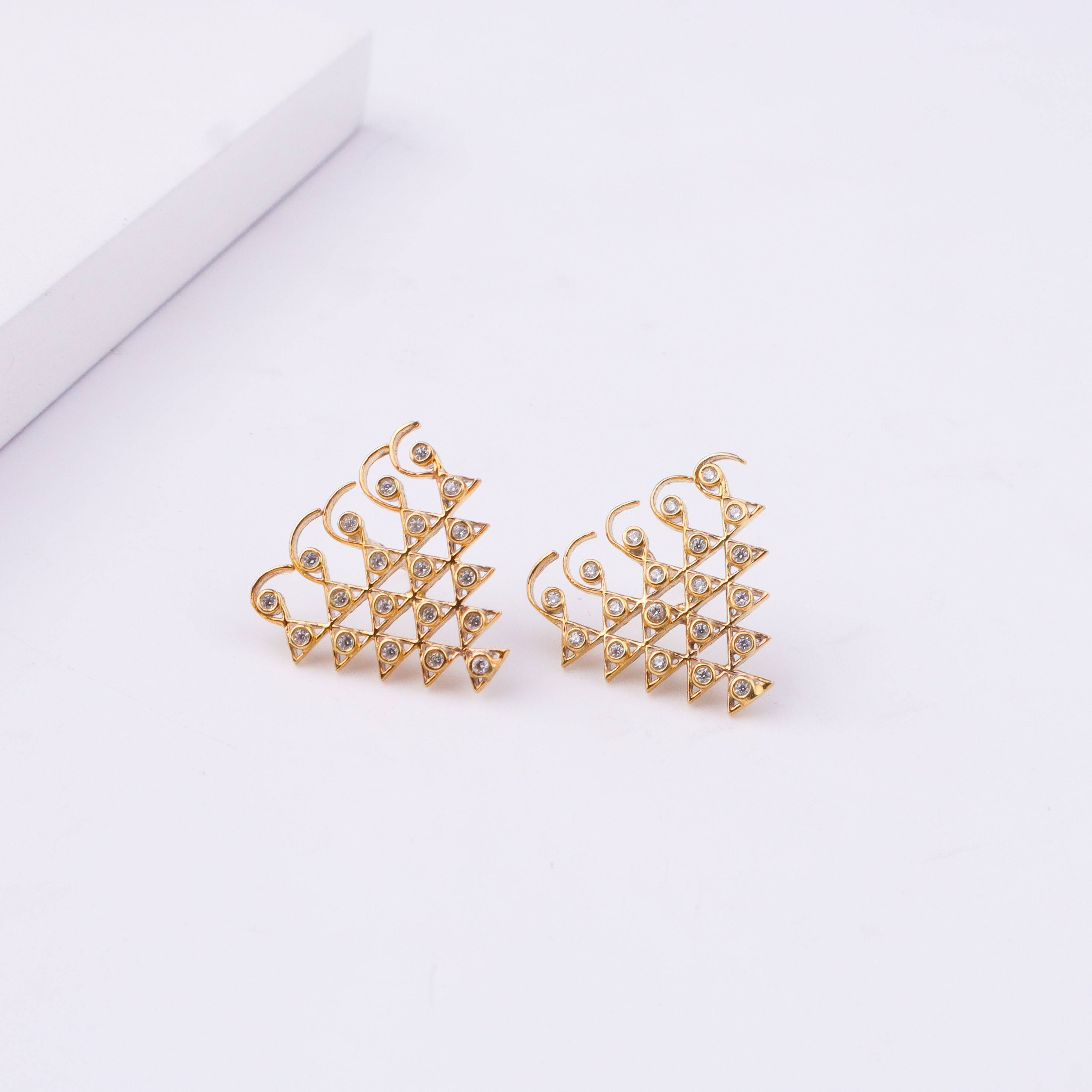Detailed view of Saraswati Earrings highlighting intricate motifs, fine texture, and polished 22K gold-plated finish