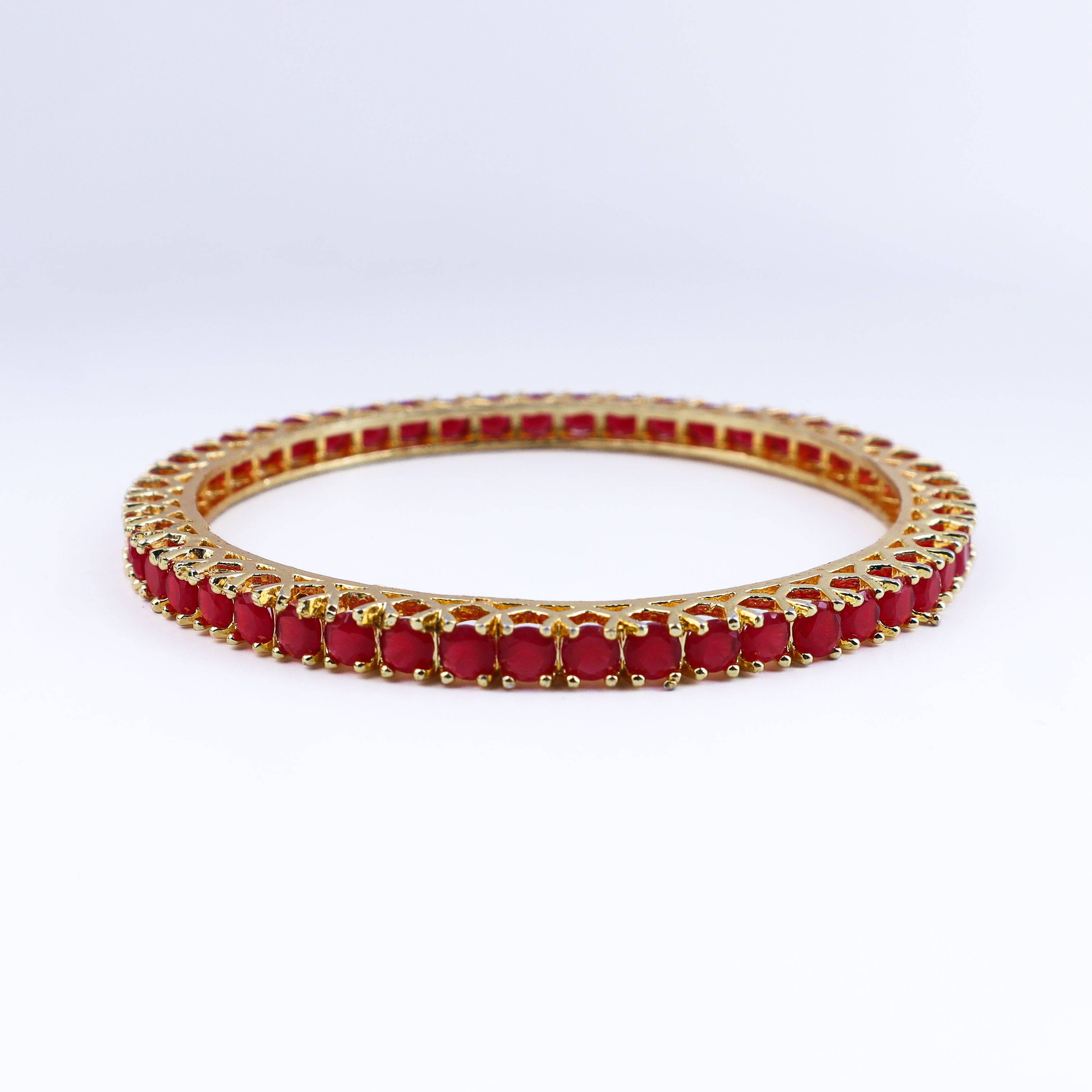 Close-up of a 22K gold-plated fashion bangle (single) showcasing intricate detailing, fine craftsmanship, and rich 22K gold plating