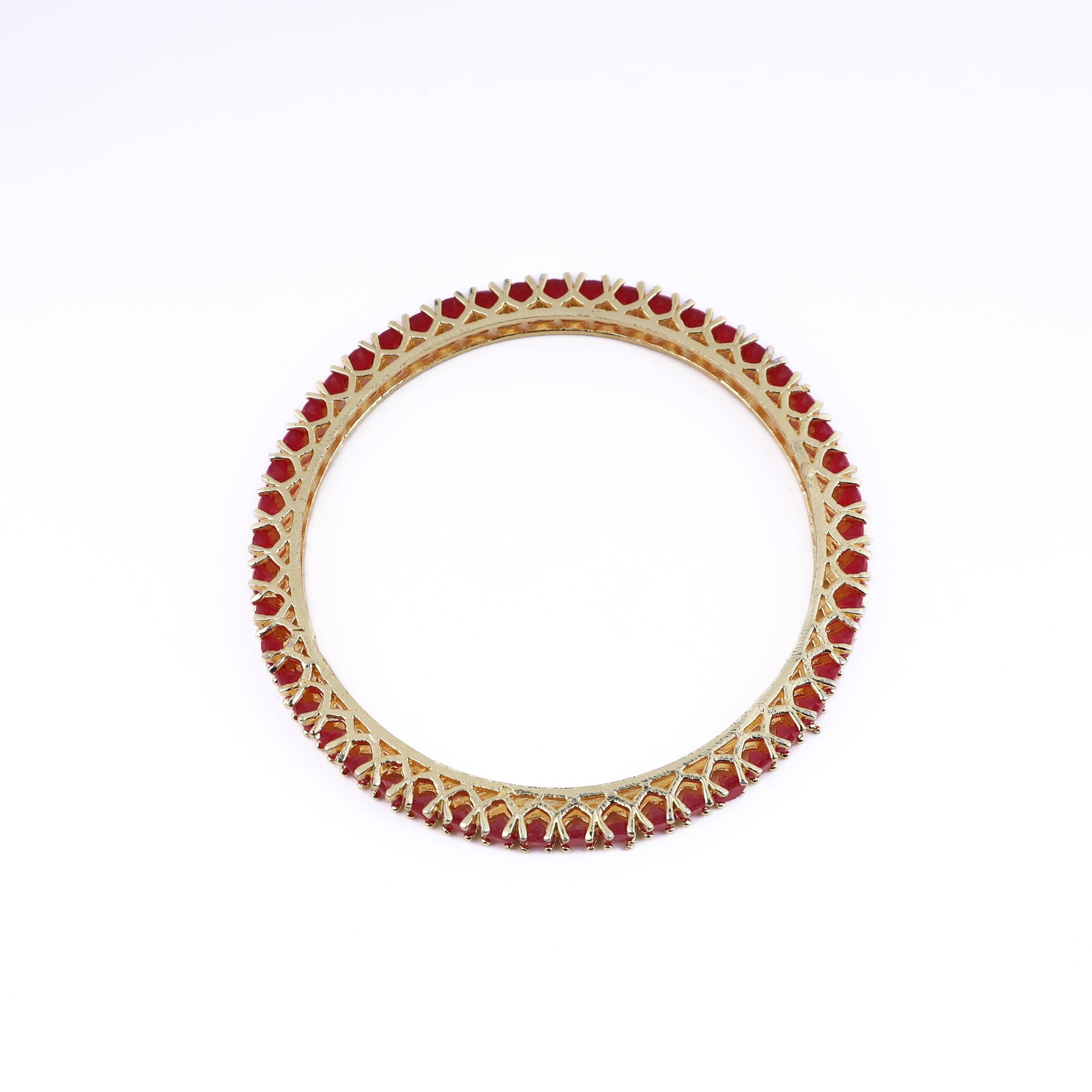 Detailed view of a 22K gold-plated fashion bangle (single) highlighting intricate motifs, textured detailing, and a premium 22K gold-plated finish