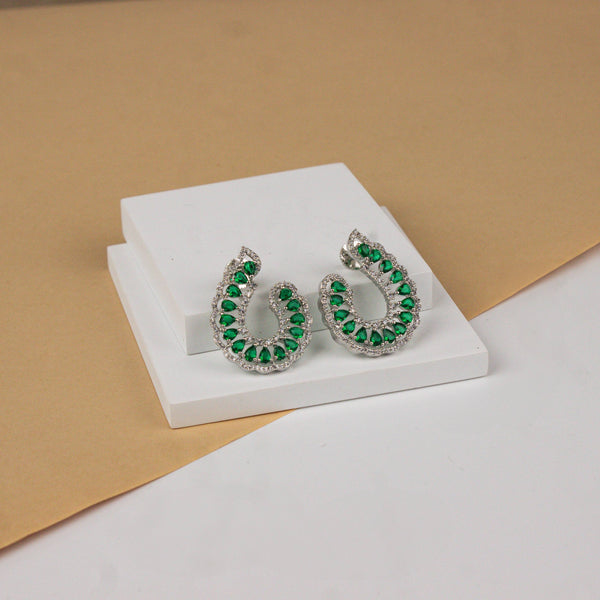 Angled view of the fashion earring highlighting its unique silhouette, structure, and polished finish