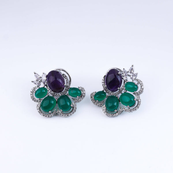 Detailed view of the fashion earring highlighting intricate motifs, textured detailing, and a smooth jewelry finish