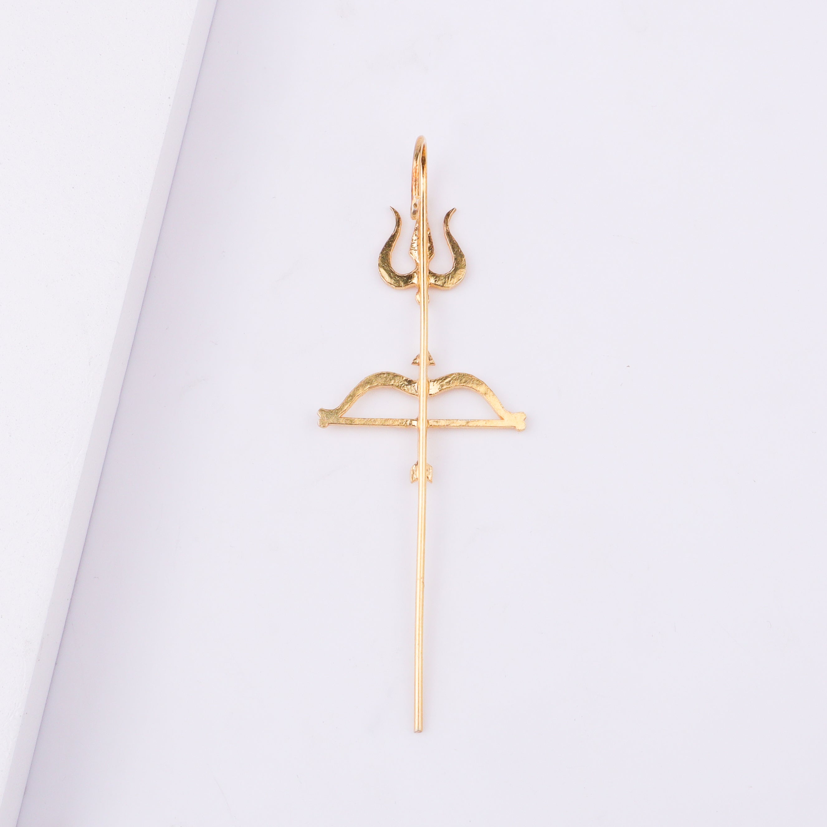 Side view of gold Trishul Earcuff jewelry