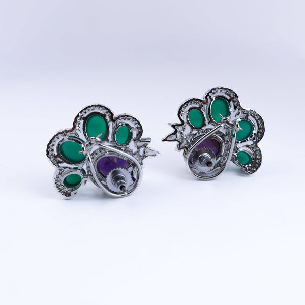 Angled view of the fashion earring highlighting its unique silhouette, structure, and polished finish