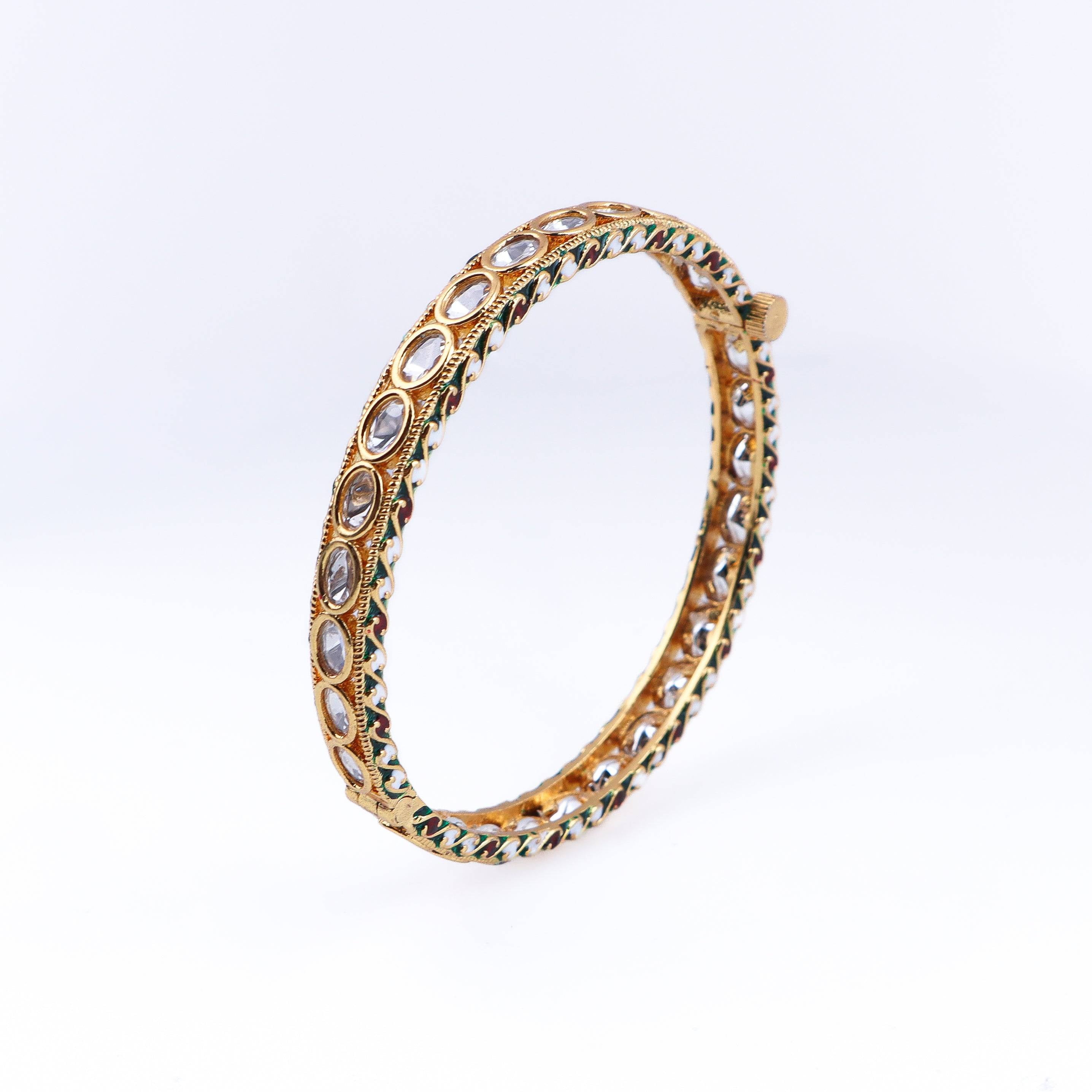 Angled view of 22K gold-plated fashion bangle (single) highlighting its elegant structure and polished gold finish