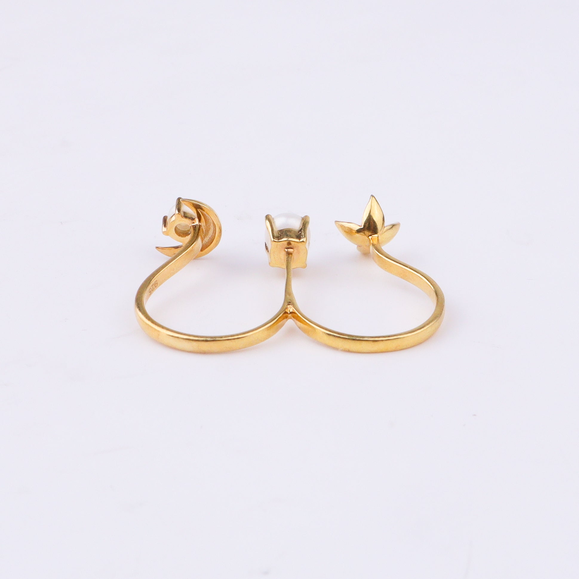 Gold moon and pearl ring with floral design