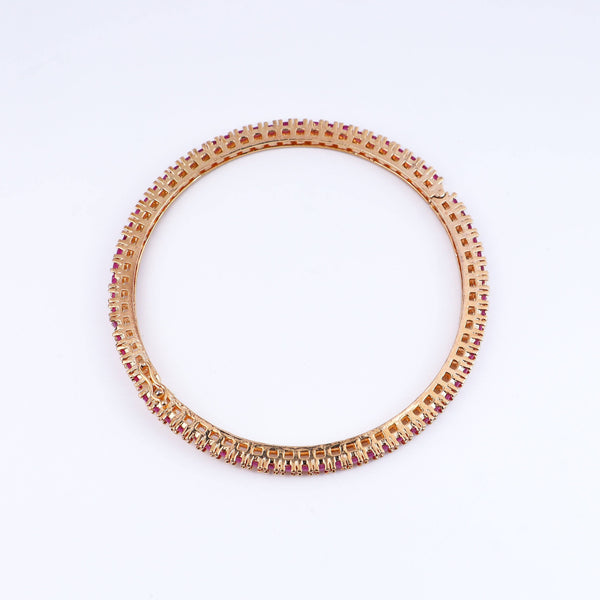 Detailed view of a 22K gold-plated fashion bangle (single) highlighting intricate motifs, textured detailing, and a premium 22K gold-plated finish