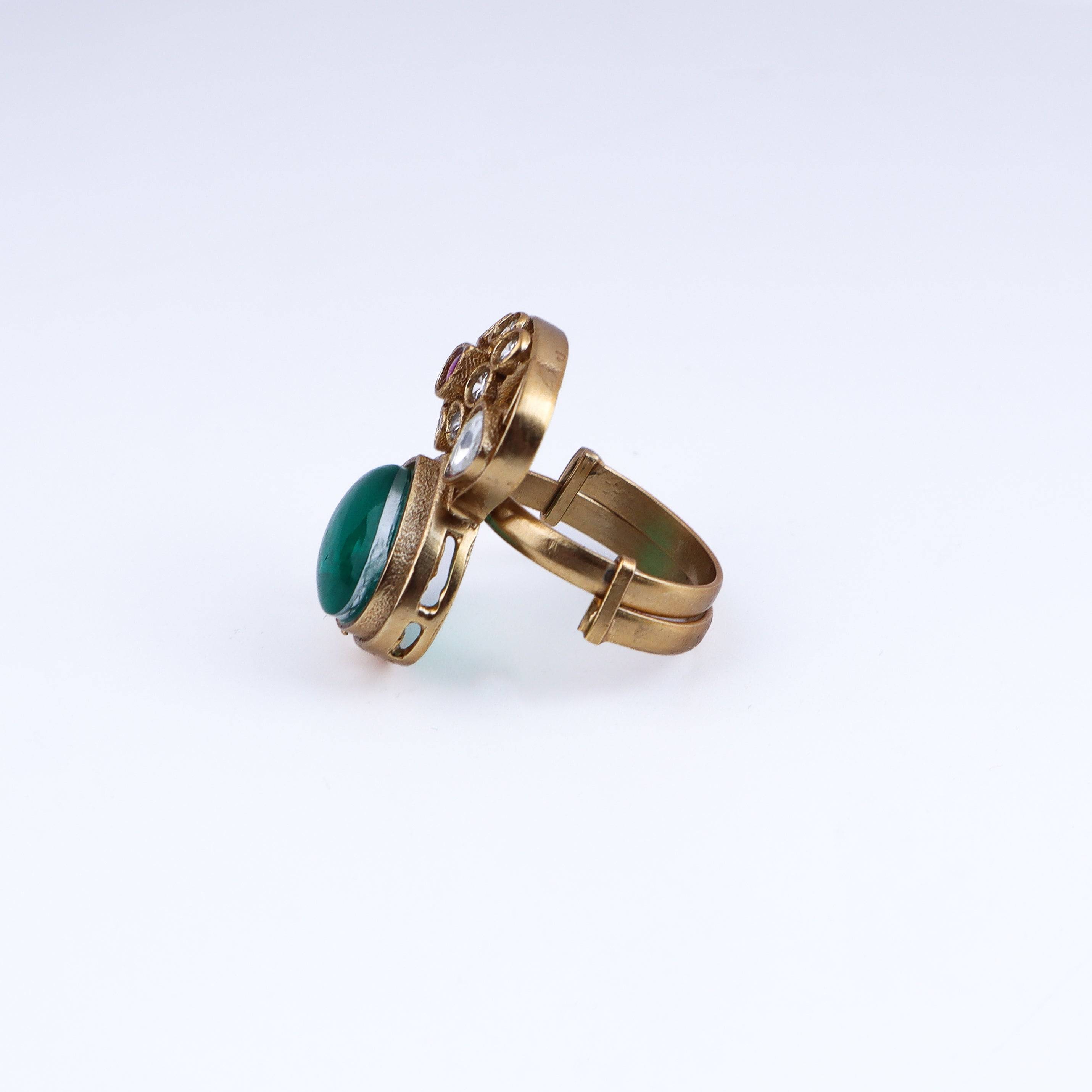 Detailed view of a 22K gold-plated fashion ring highlighting intricate motifs, textured detailing, and premium 22K gold-plated finish