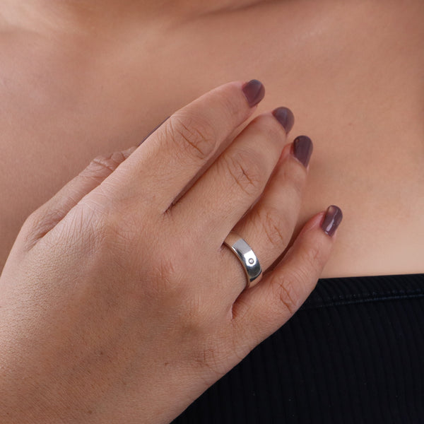 Silver CZ unisex band ring on finger