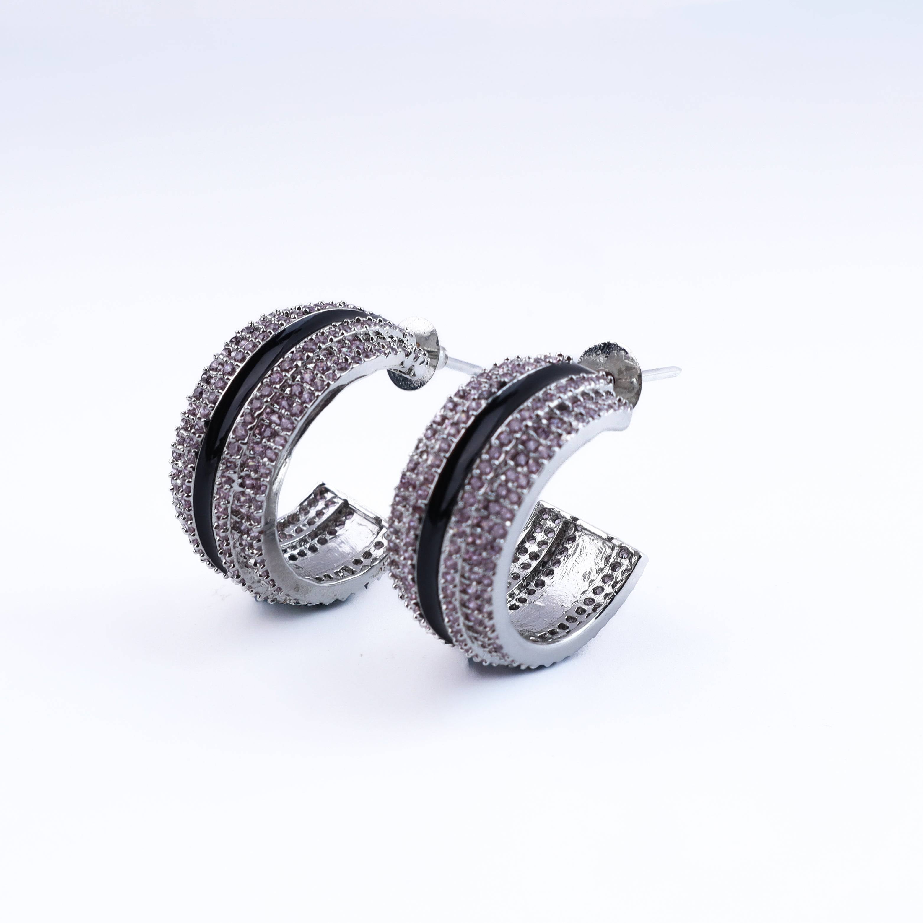 Close-up of a fashion earring showcasing intricate detailing, fine craftsmanship, and a refined finish