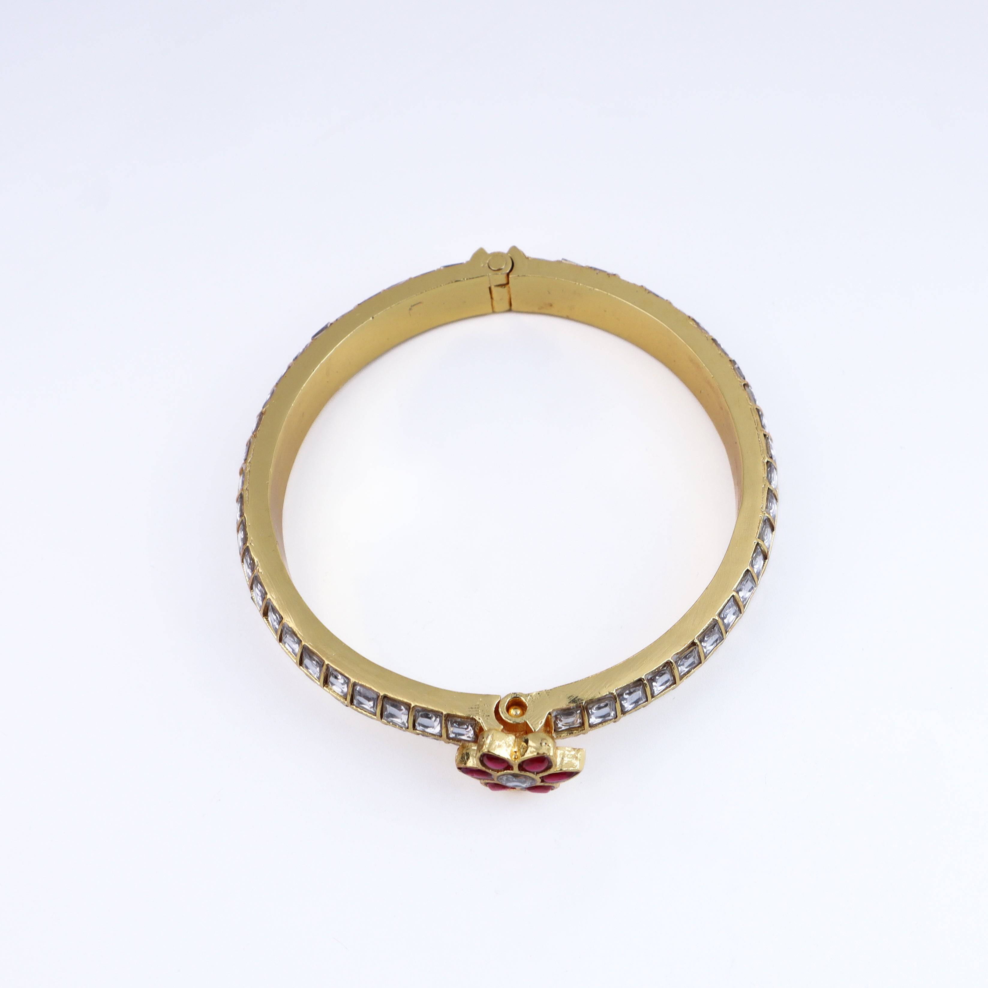 Detailed view of 22K gold-plated fashion bangle (single) highlighting intricate motifs, textured detailing, and premium 22K gold-plated finish