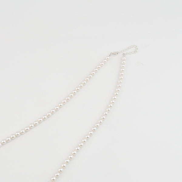 Woman styling Luxe Necklace with Unakite stones and pearls