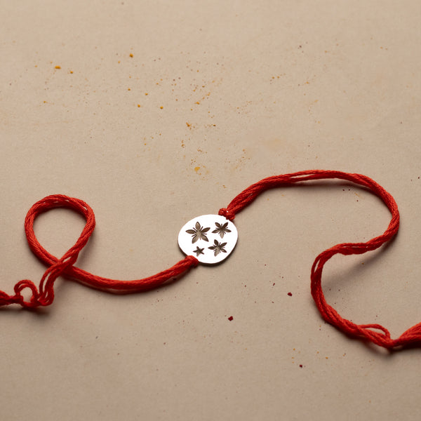Silver Laser Cut Floral Rakhi