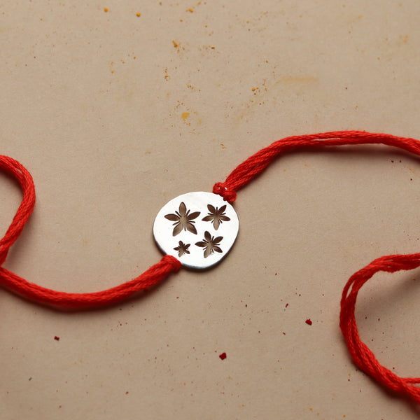 Silver Laser Cut Floral Rakhi