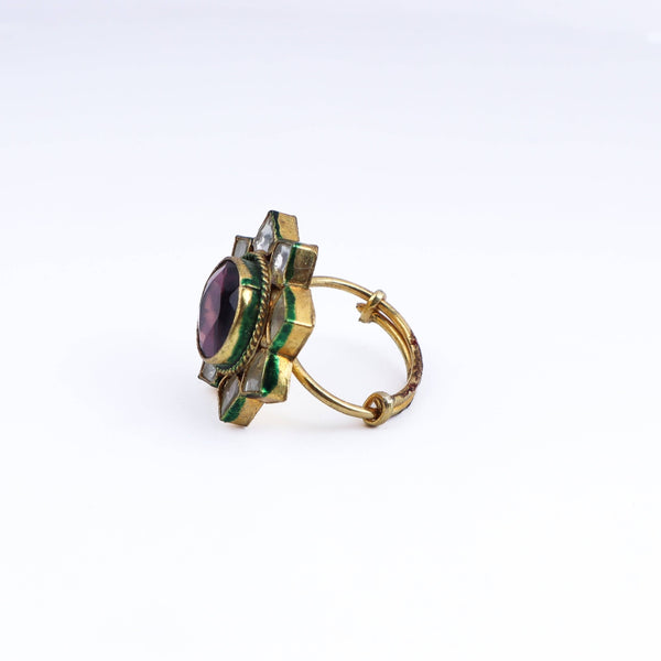 Angled view of a 22K gold-plated fashion ring highlighting its elegant shape, unique structure, and polished gold finish