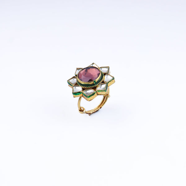 Detailed view of a 22K gold-plated fashion ring highlighting intricate motifs, textured detailing, and a premium 22K gold-plated finish