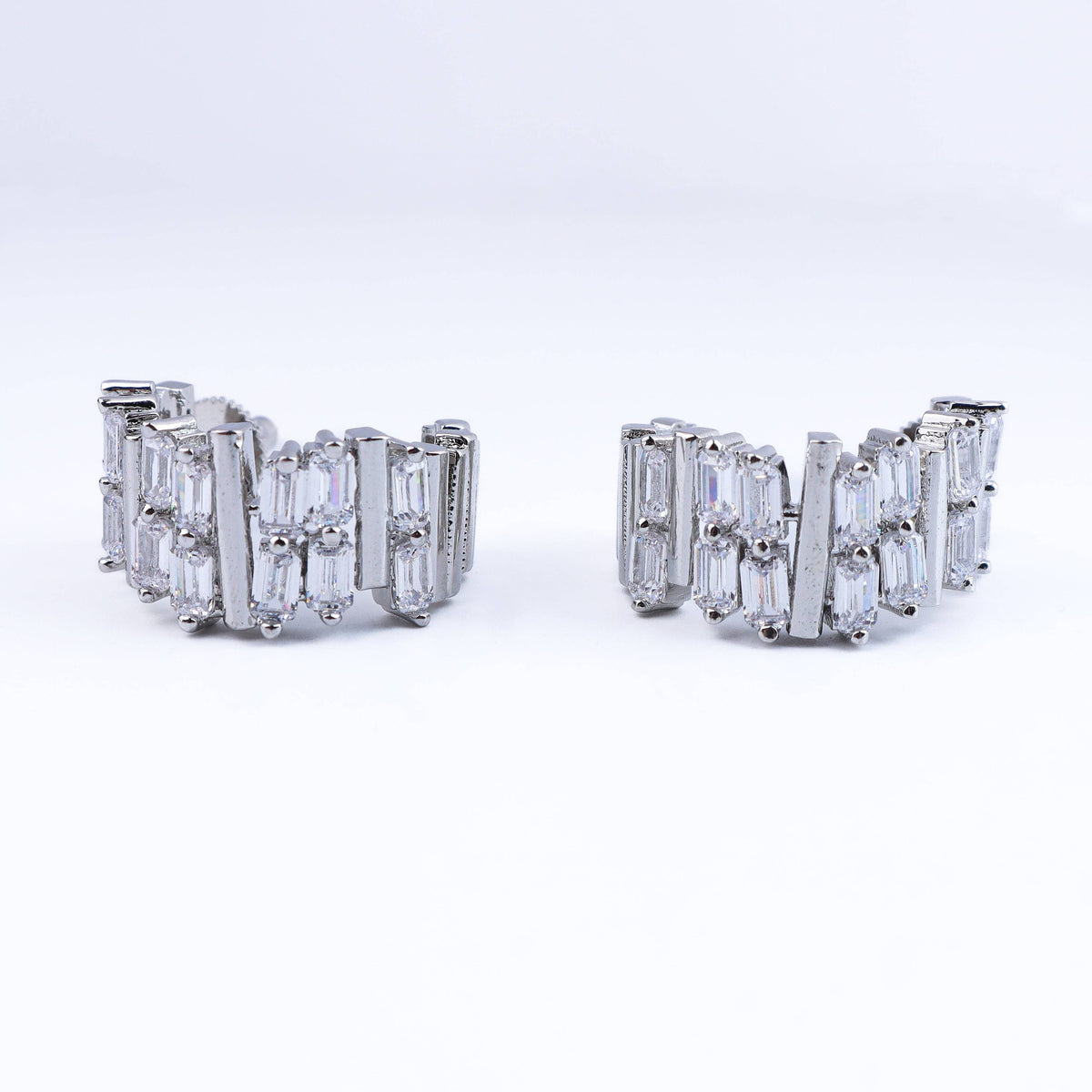 Close-up of a fashion earring showcasing intricate detailing, fine craftsmanship, and refined finish