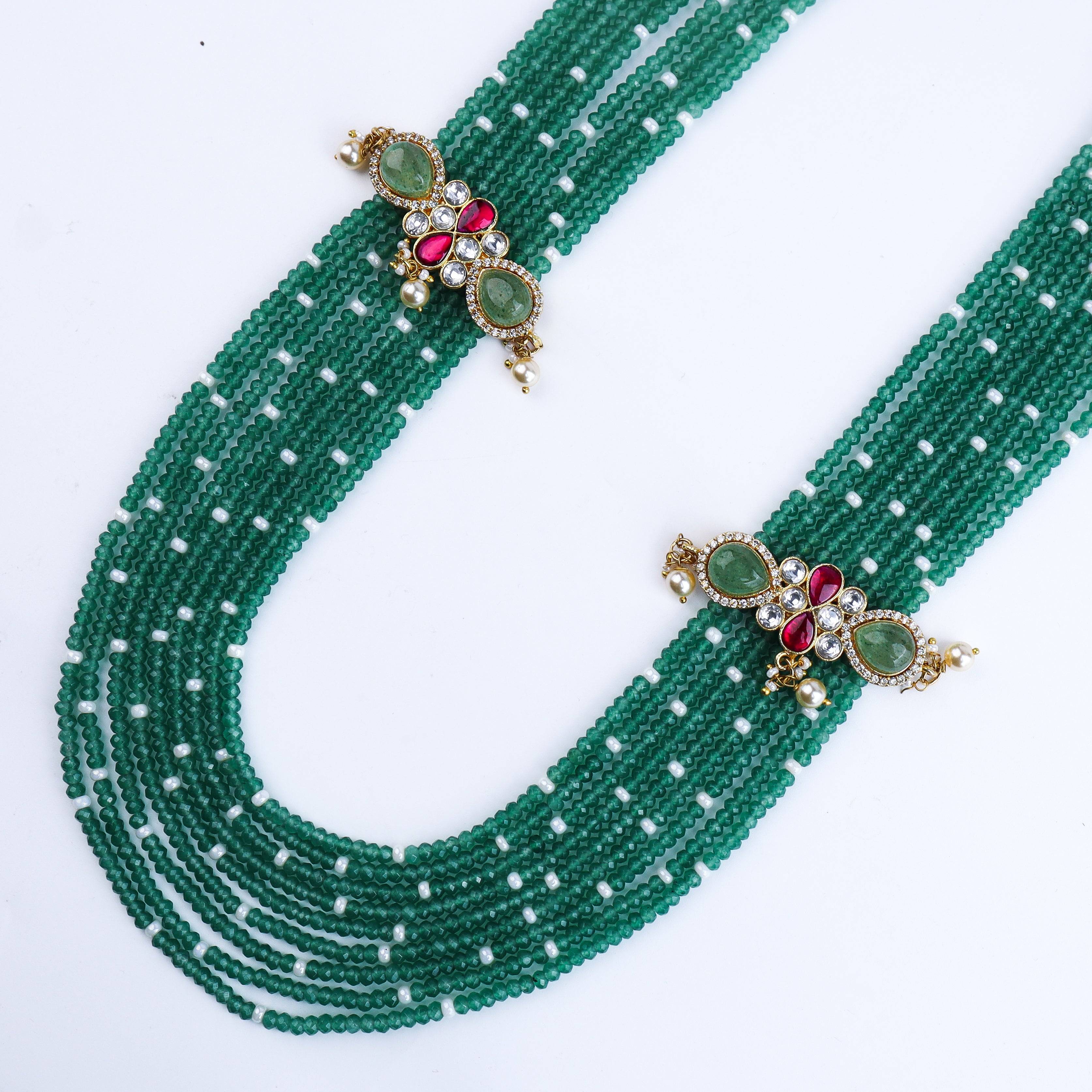Angled view of a 22K gold-plated fashion necklace highlighting its elegant structure, design, and polished gold finish
