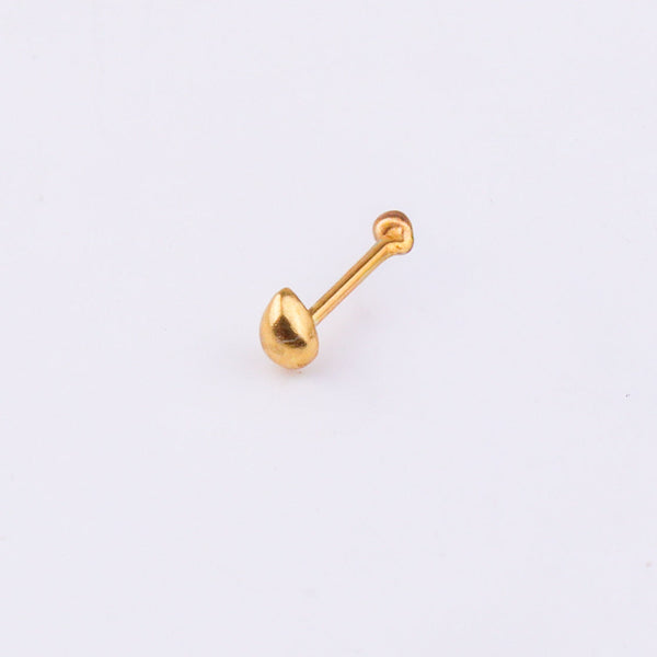 Close-up of gold nose pin