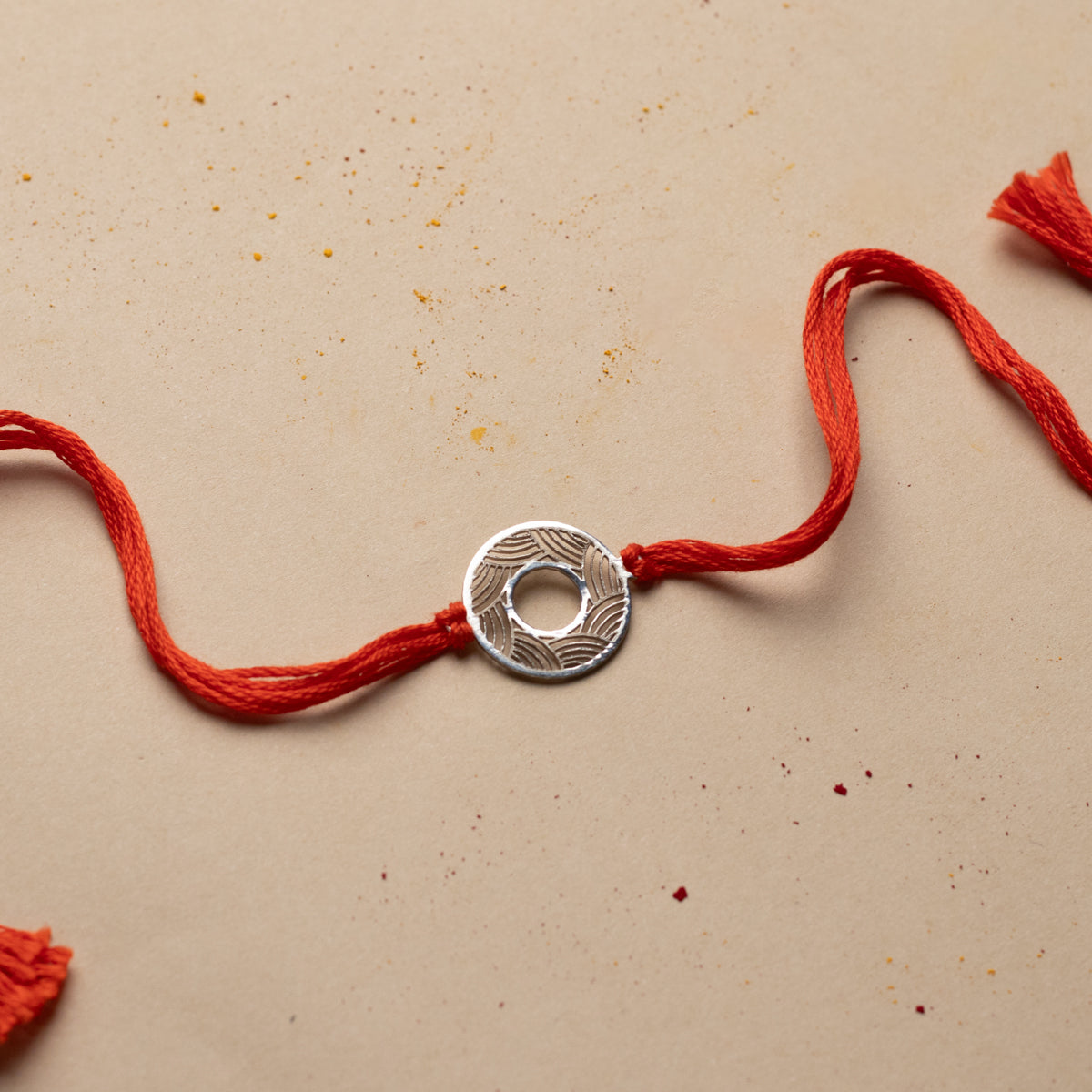 Silver Laser Cut Ripple Pattern Rakhi