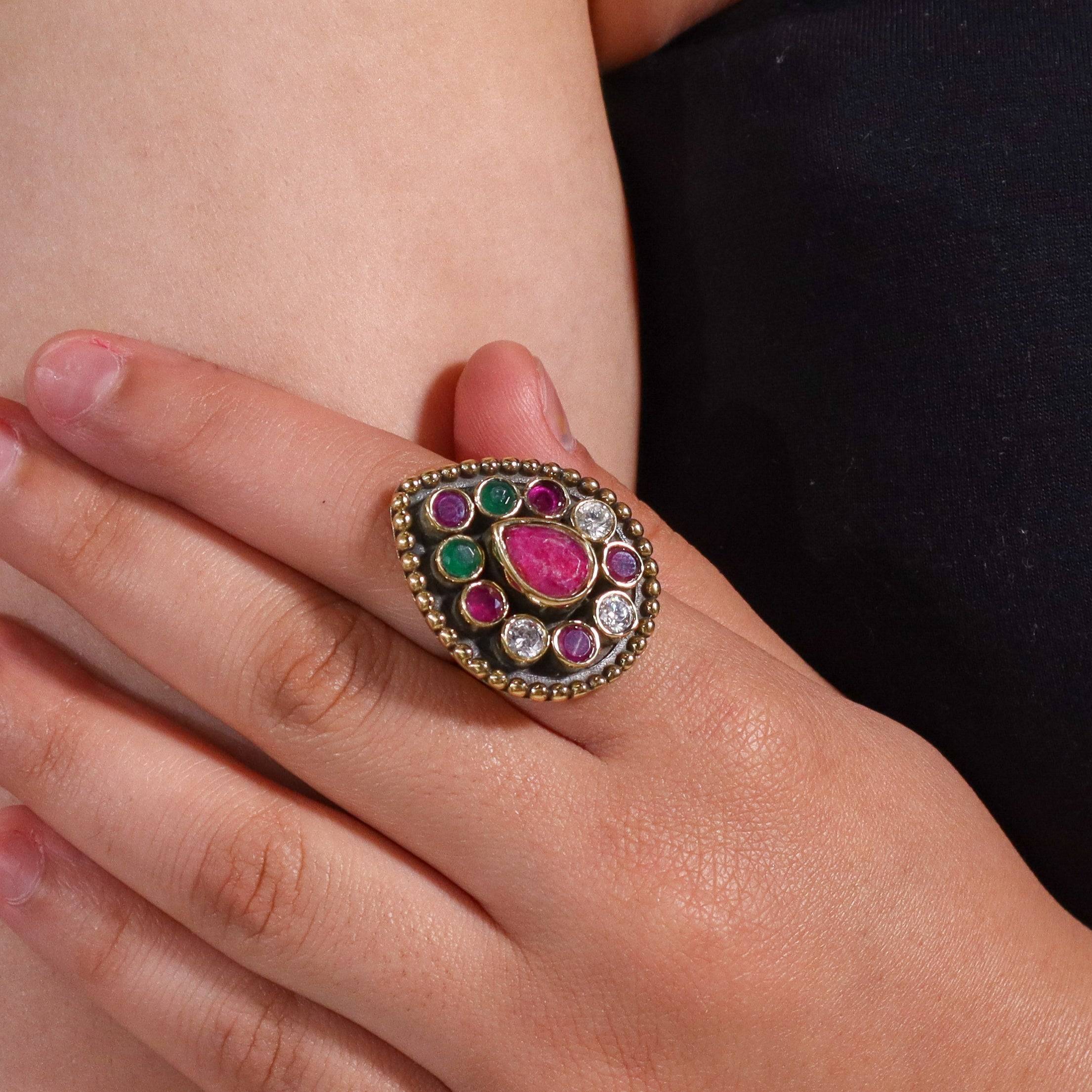 Model wearing a brass fashion ring for a stylish and contemporary fashion jewellery look