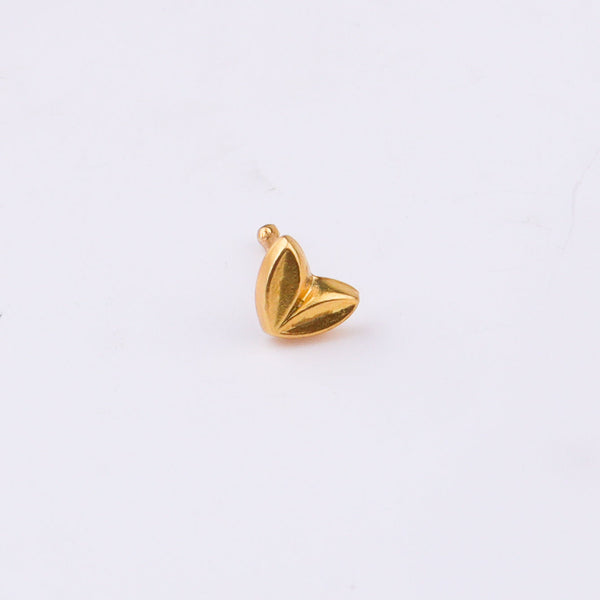 Gold heart nose pin with backing on white background
