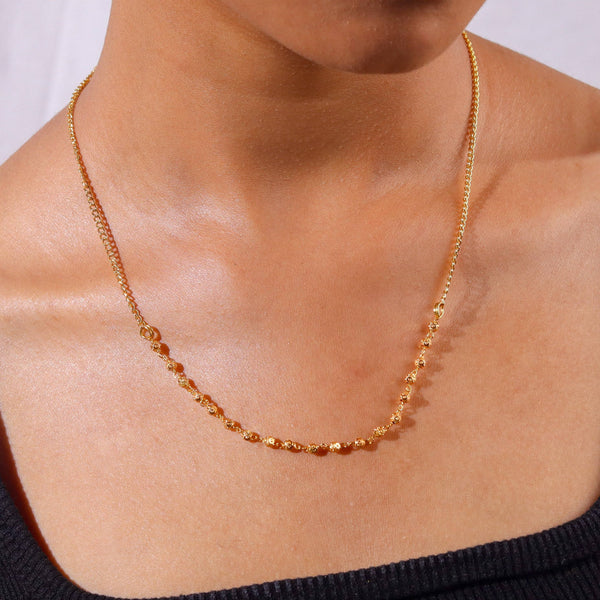 Model wearing a 22K gold-plated fashion chain for a sophisticated and contemporary jewelry look