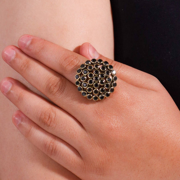Model wearing a brass fashion ring for a stylish and contemporary fashion jewellery look