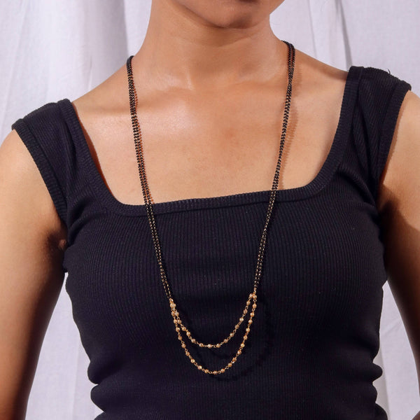 Model wearing 22K gold-plated fashion mangalsutra for an elegant and sophisticated traditional jewelry look
