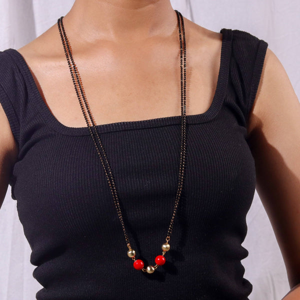 Model wearing 22K gold-plated fashion mangalsutra for an elegant and sophisticated traditional jewelry look