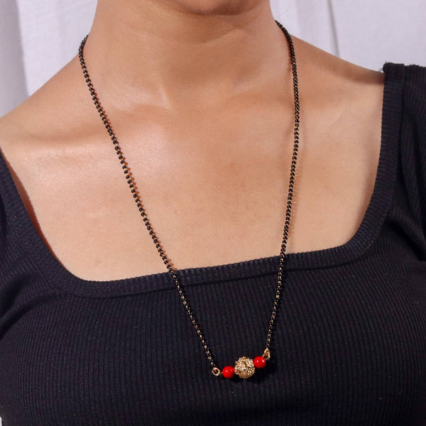 Model wearing 22K gold-plated fashion mangalsutra for an elegant and sophisticated traditional jewellery look