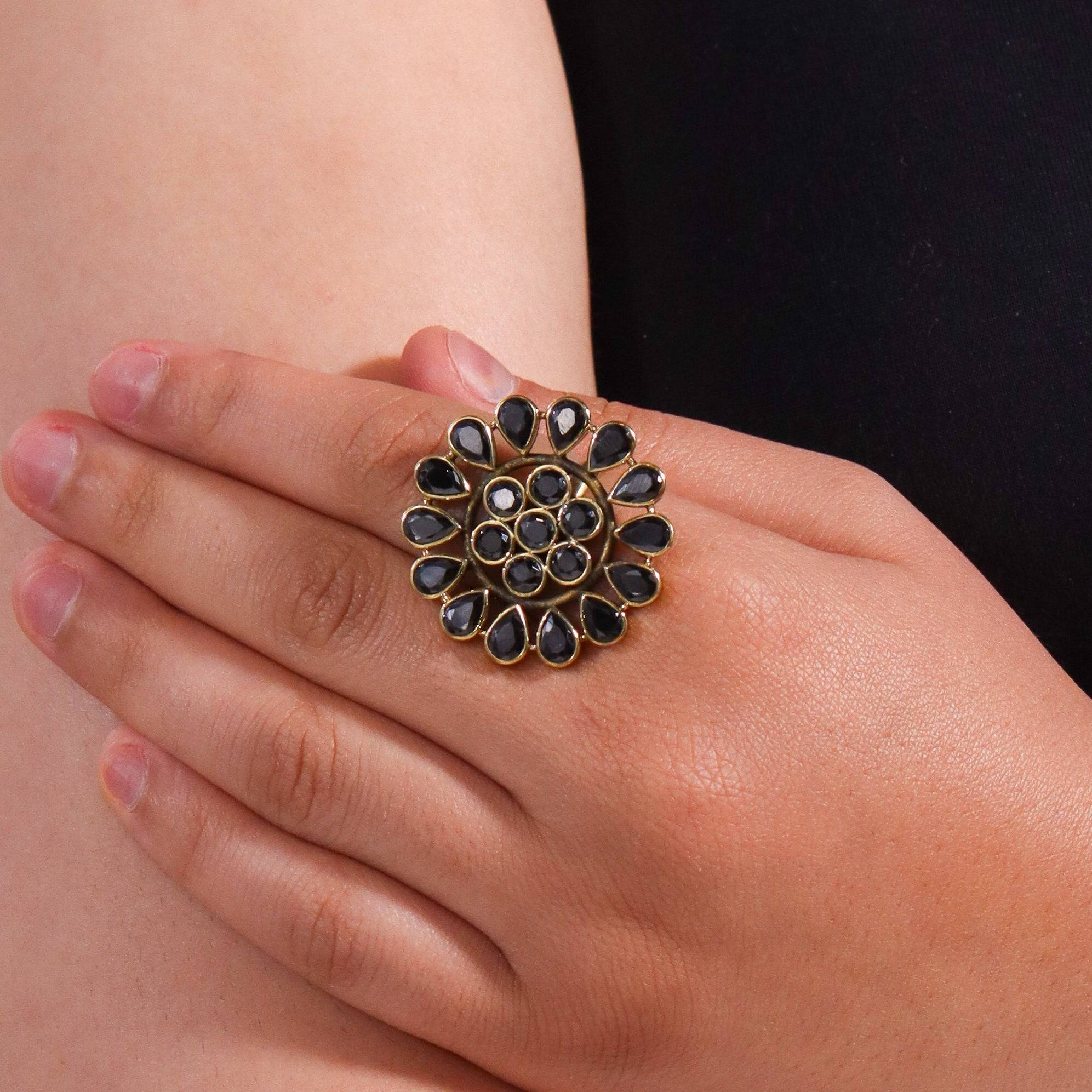 Model wearing a brass fashion ring for a stylish and contemporary fashion jewellery look