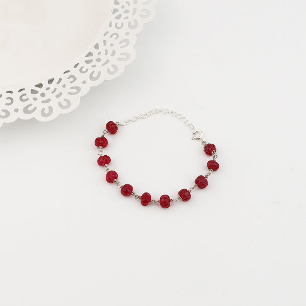 Detail shot of ganthan pattern and ruby stone setting