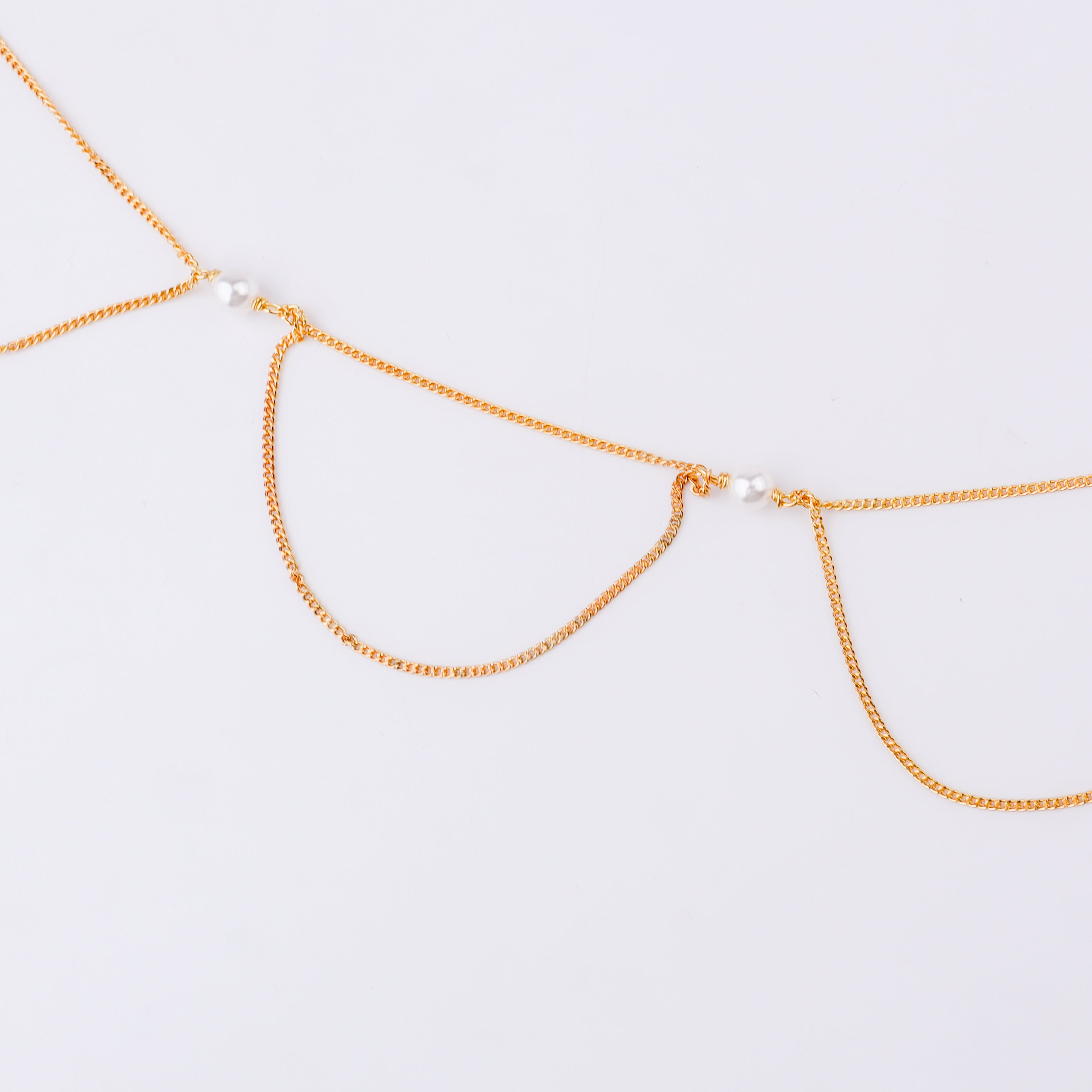 Gold waist chain with pearl embellishments for traditional jewelry