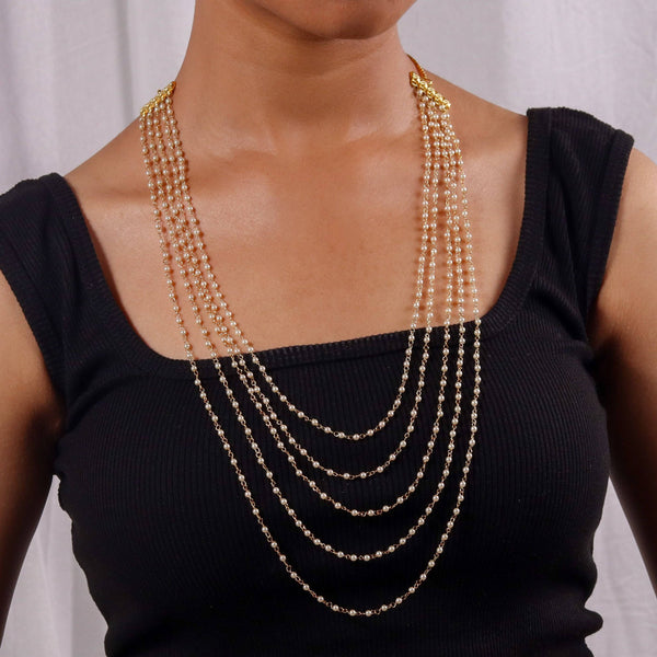 Model wearing a 22K gold-plated fashion necklace for a sophisticated and elegant jewelry look