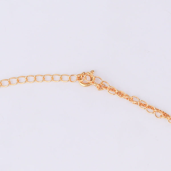Gold chain with pearl details for waist jewelry on white background
