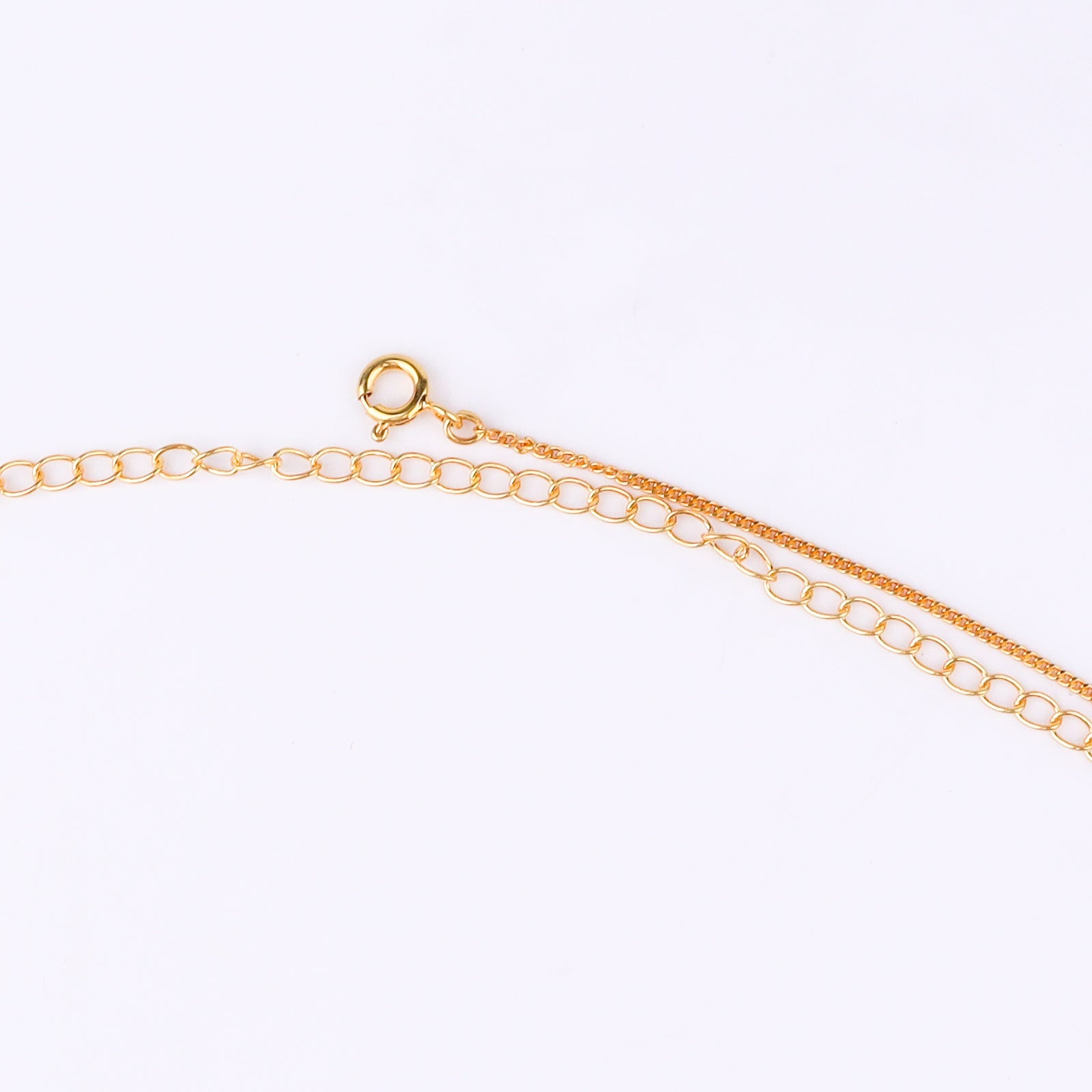 Gold chain with black beads and clasp