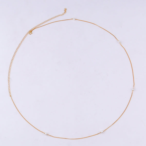 Gold chain with pearl accents