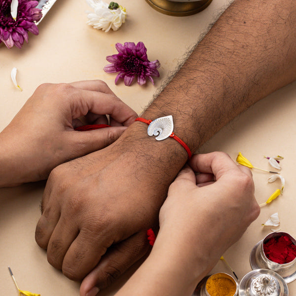 Silver Laser Cut Mayur Rakhi