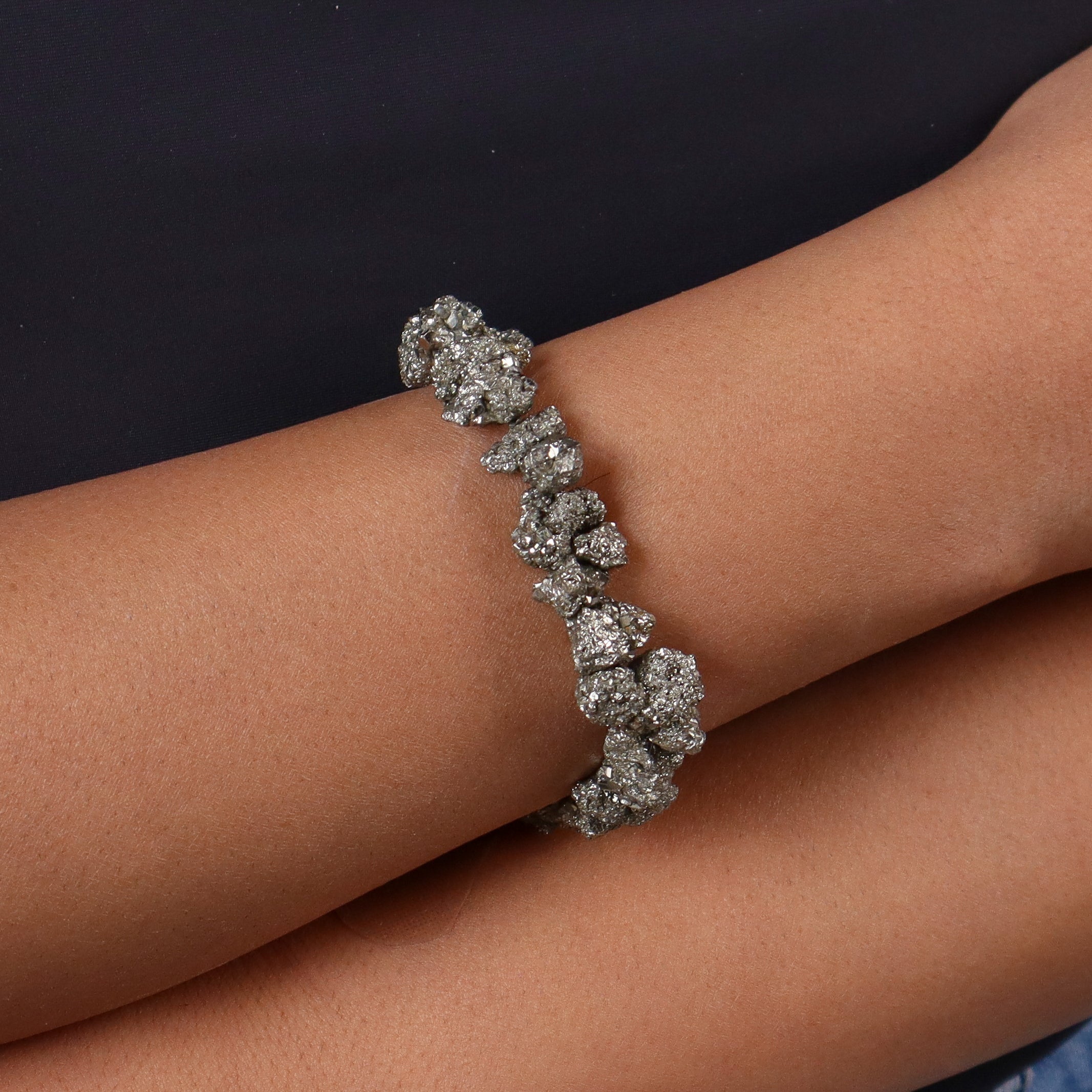 Silver pyrite bracelet on wrist