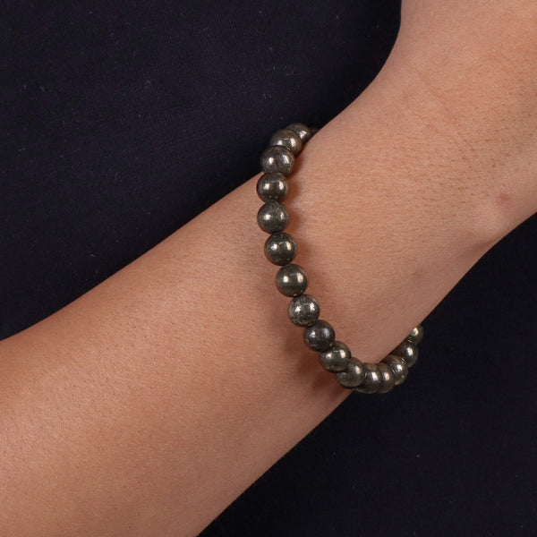 Close-up of Pyrite Pearl bracelet on wrist
