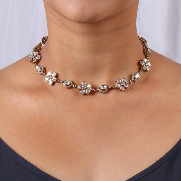 Model wearing a brass fashion necklace for a stylish and contemporary fashion jewellery look