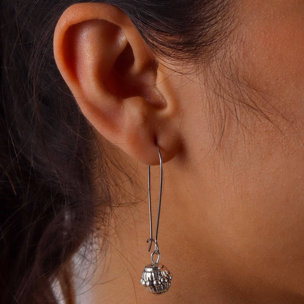 Model wearing fashion earrings for a stylish and contemporary jewelry look