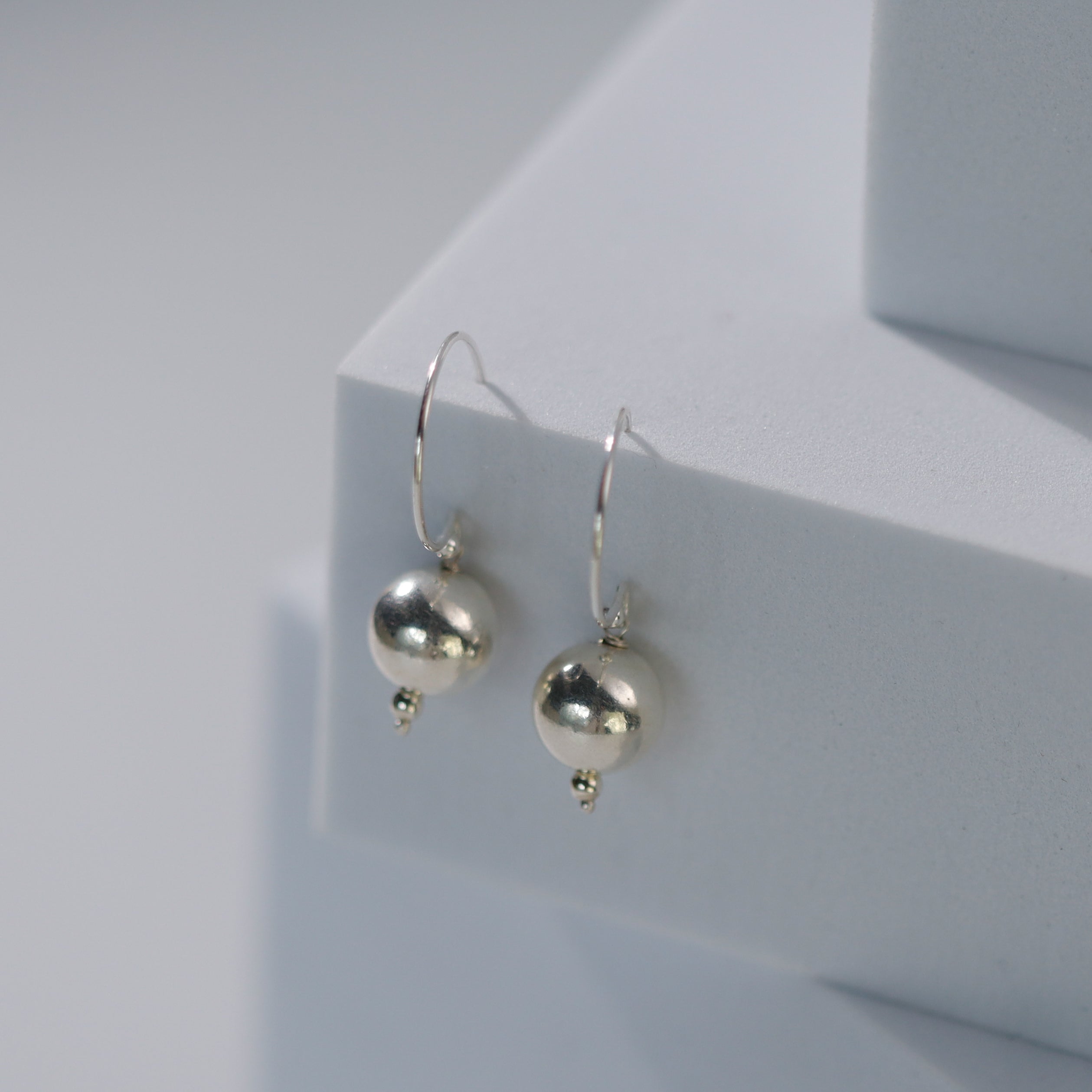 Round silver bead earrings design