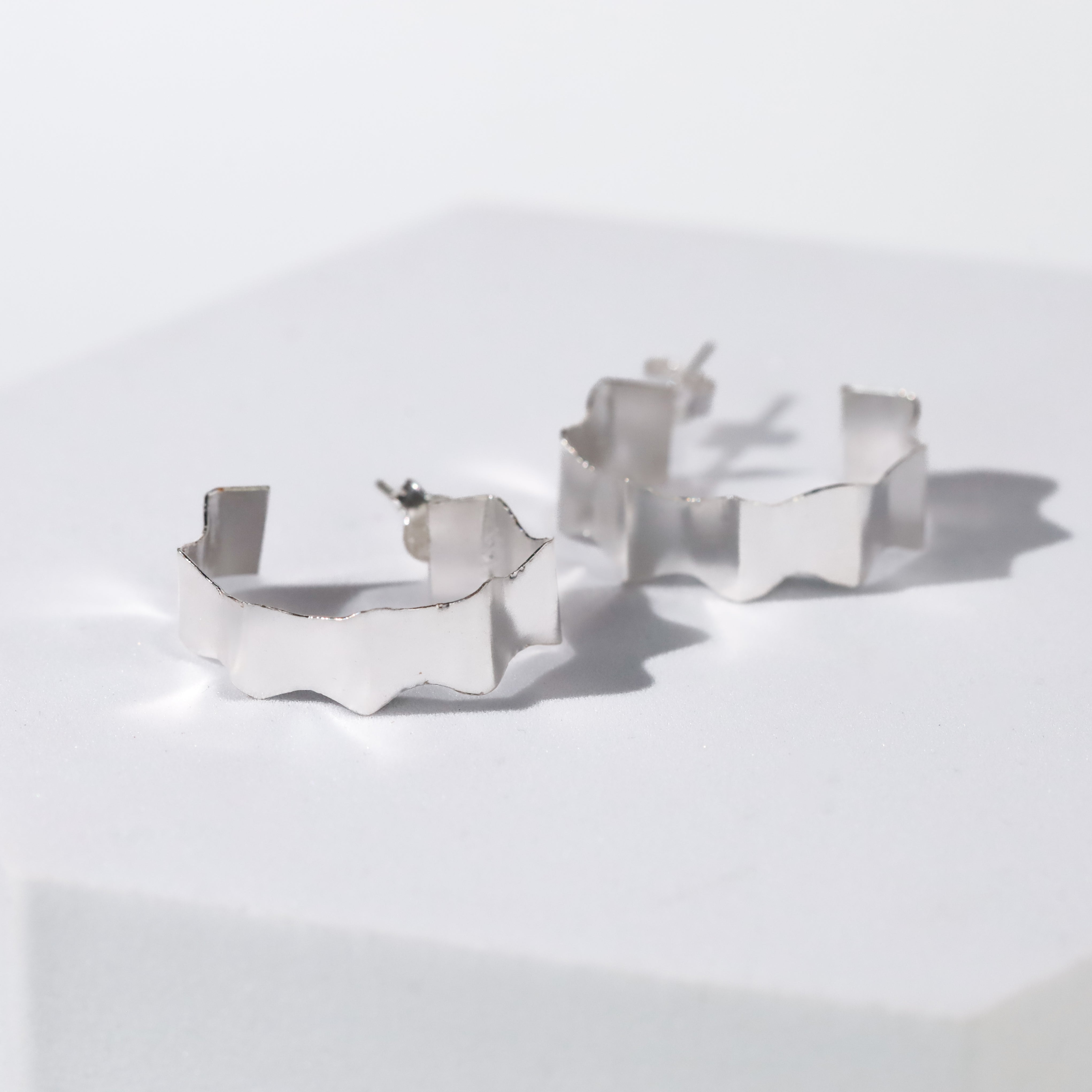 Rebecca - Fold Earrings ( Shiny Silver Finish )