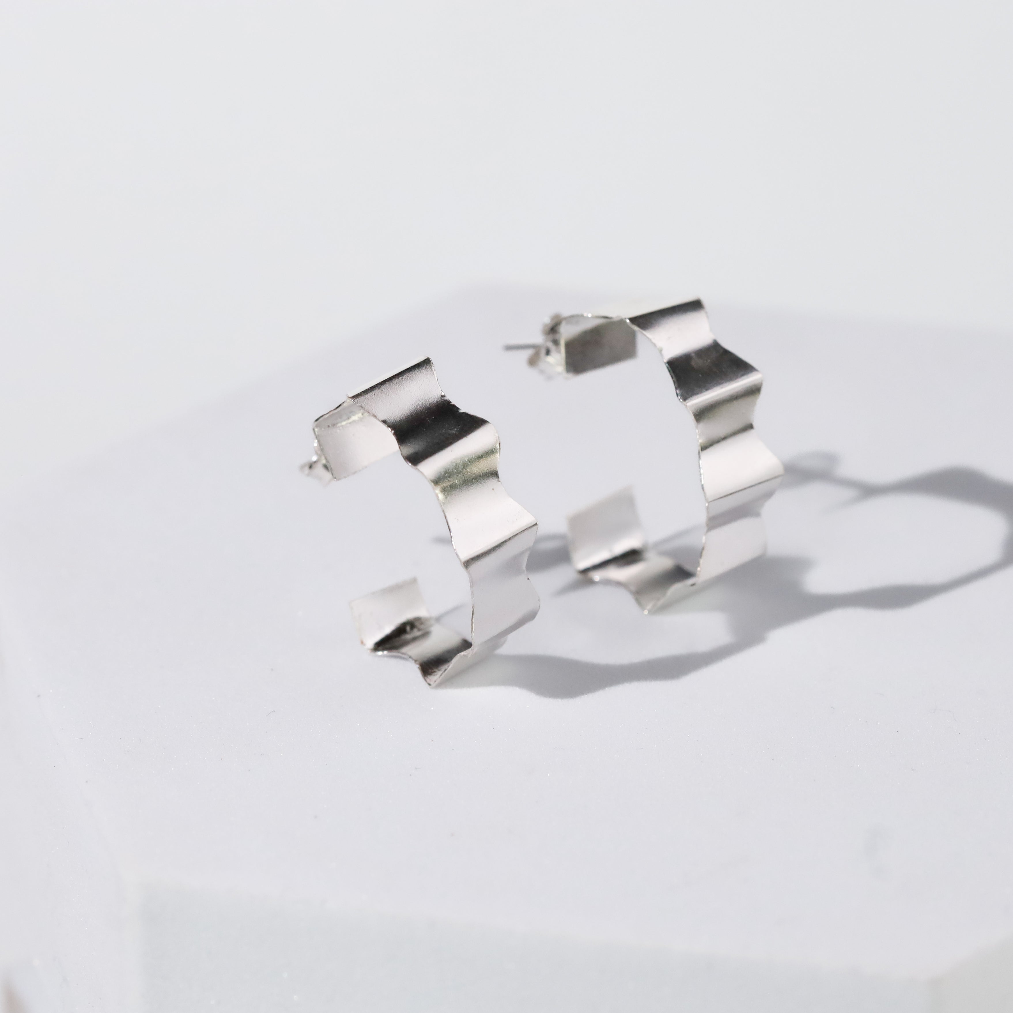 Rebecca - Fold Earrings ( Shiny Silver Finish )