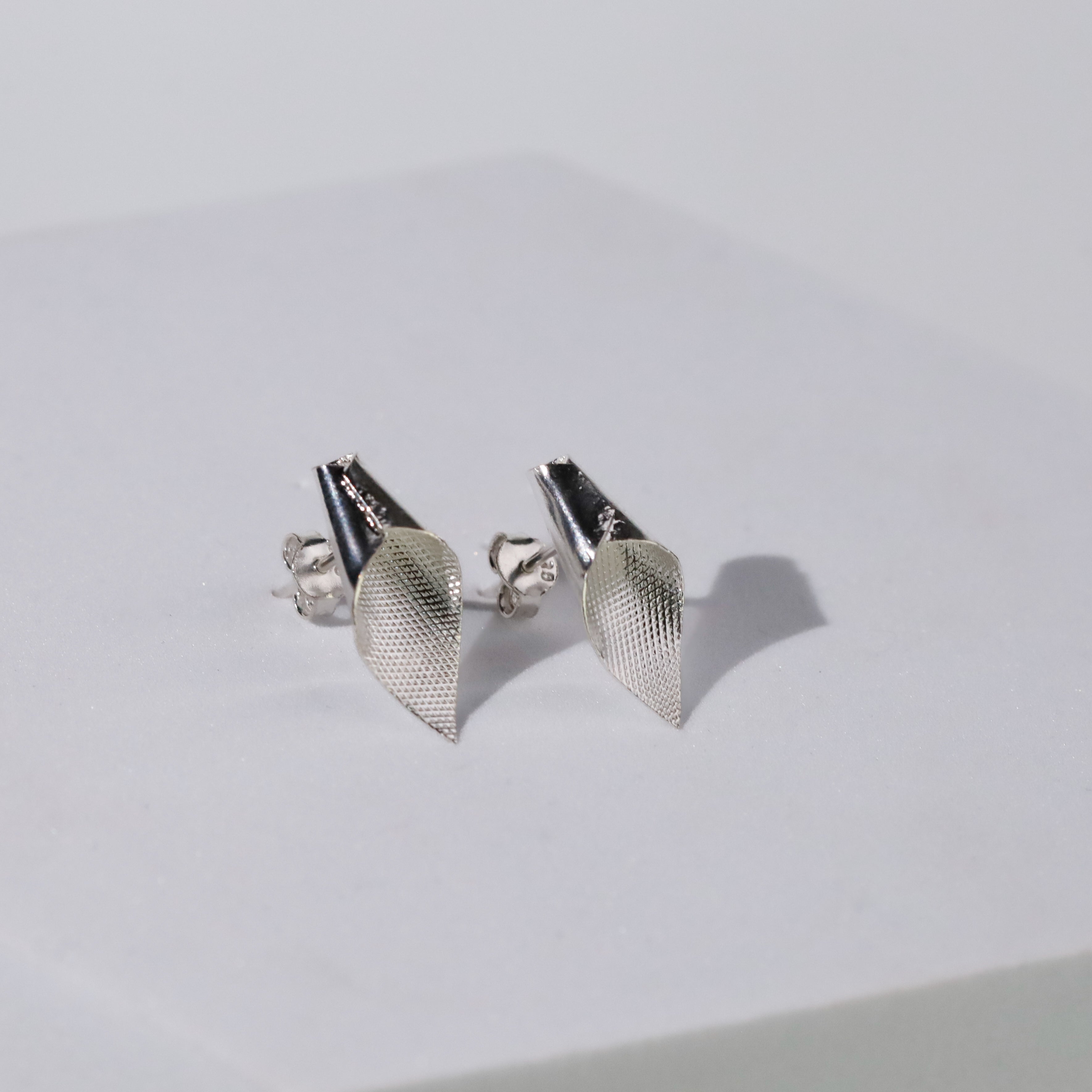 Alice- Fold Earring ( Shiny Silver Finish )