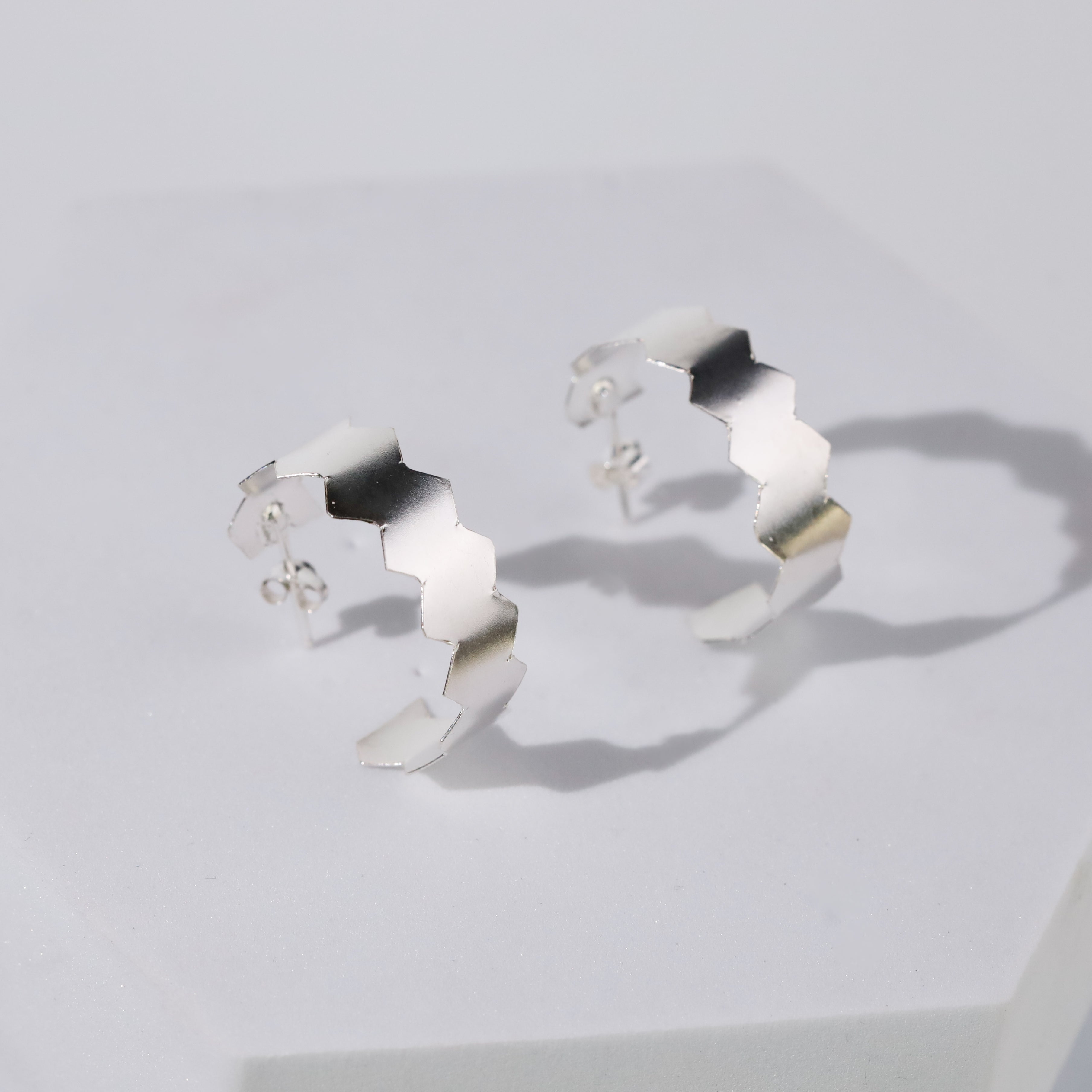 Natasha- Fold Earrings ( Shiny Silver Finish )