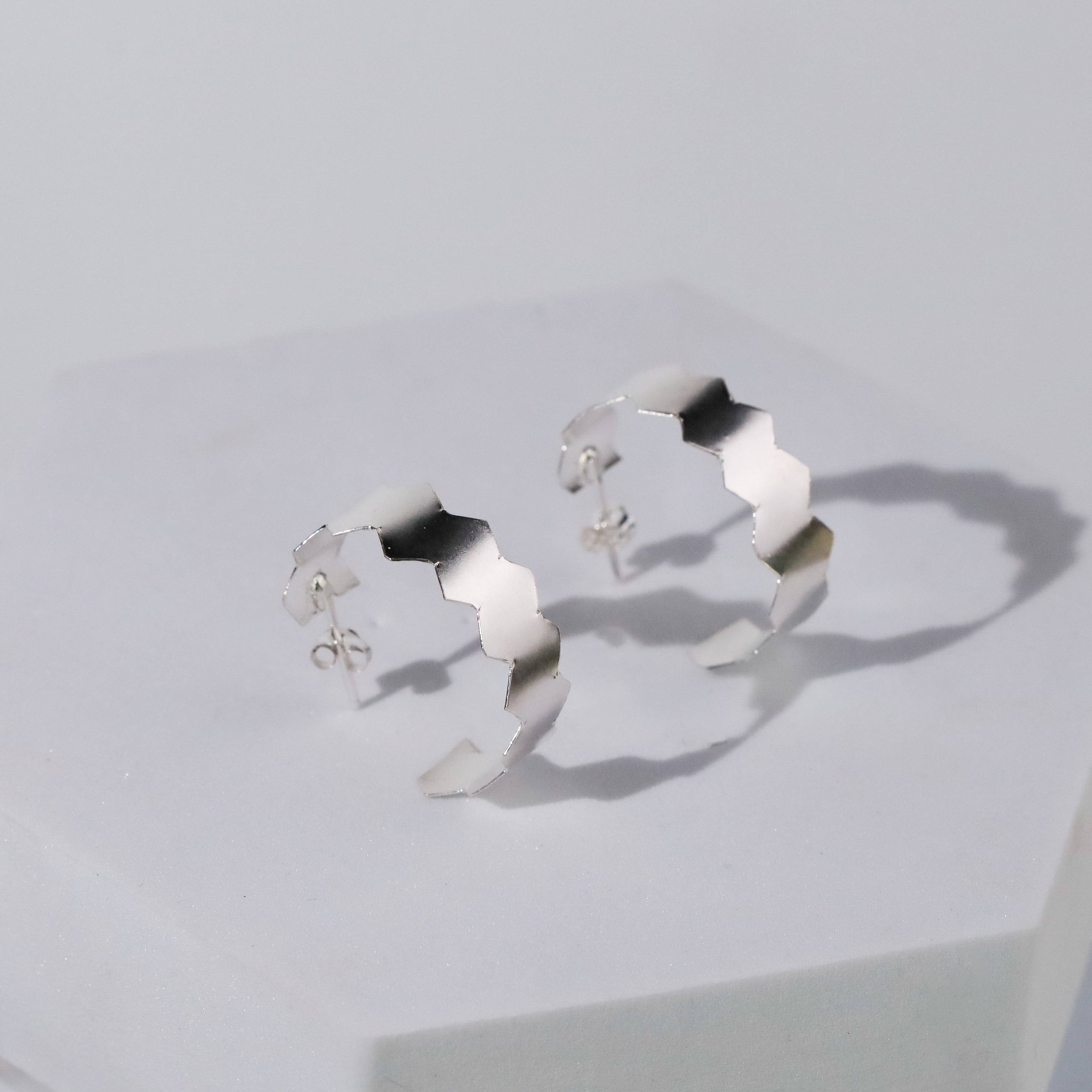 Natasha- Fold Earrings ( Shiny Silver Finish )