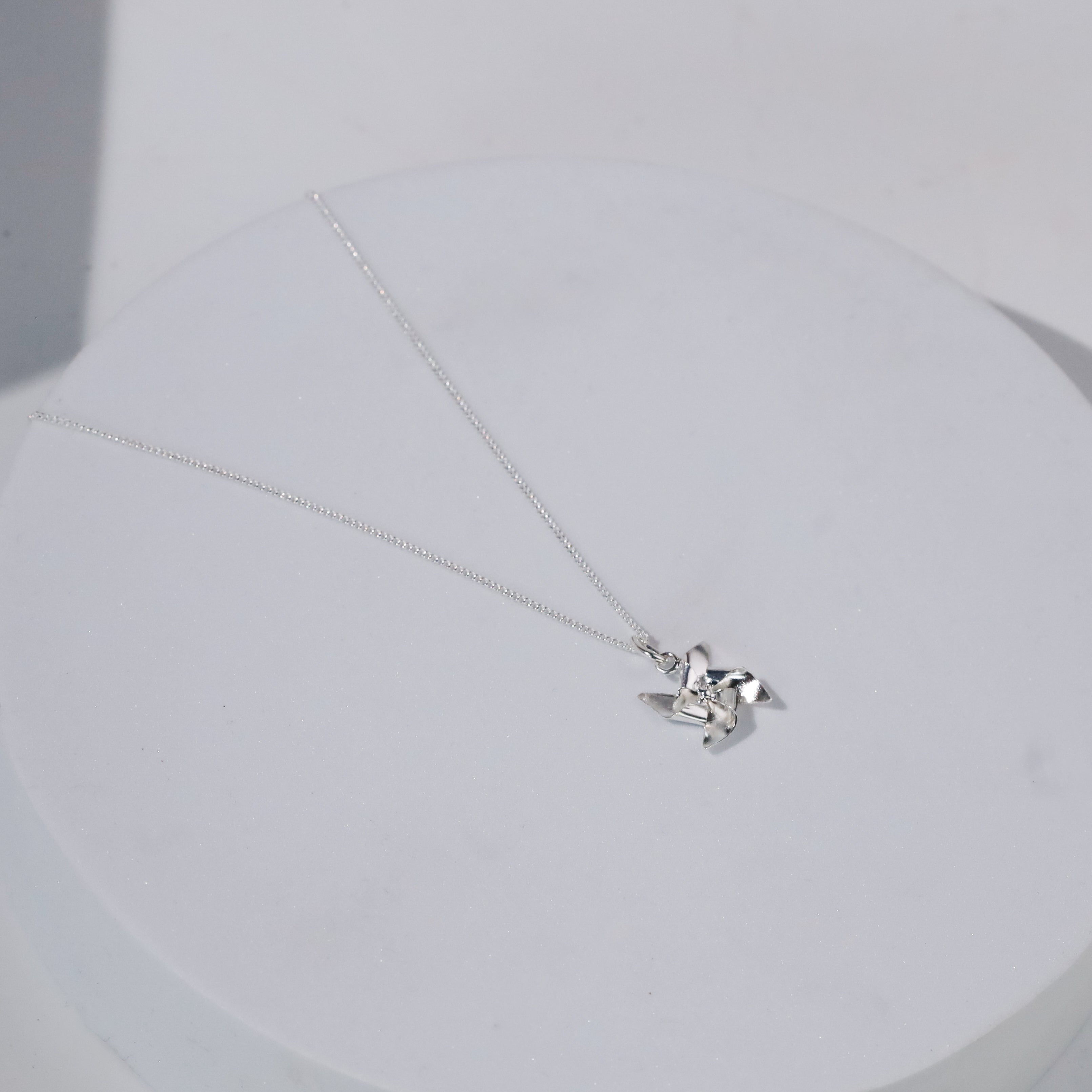 Pinwheel Necklace - Fold collection ( Shiny Silver Finish )